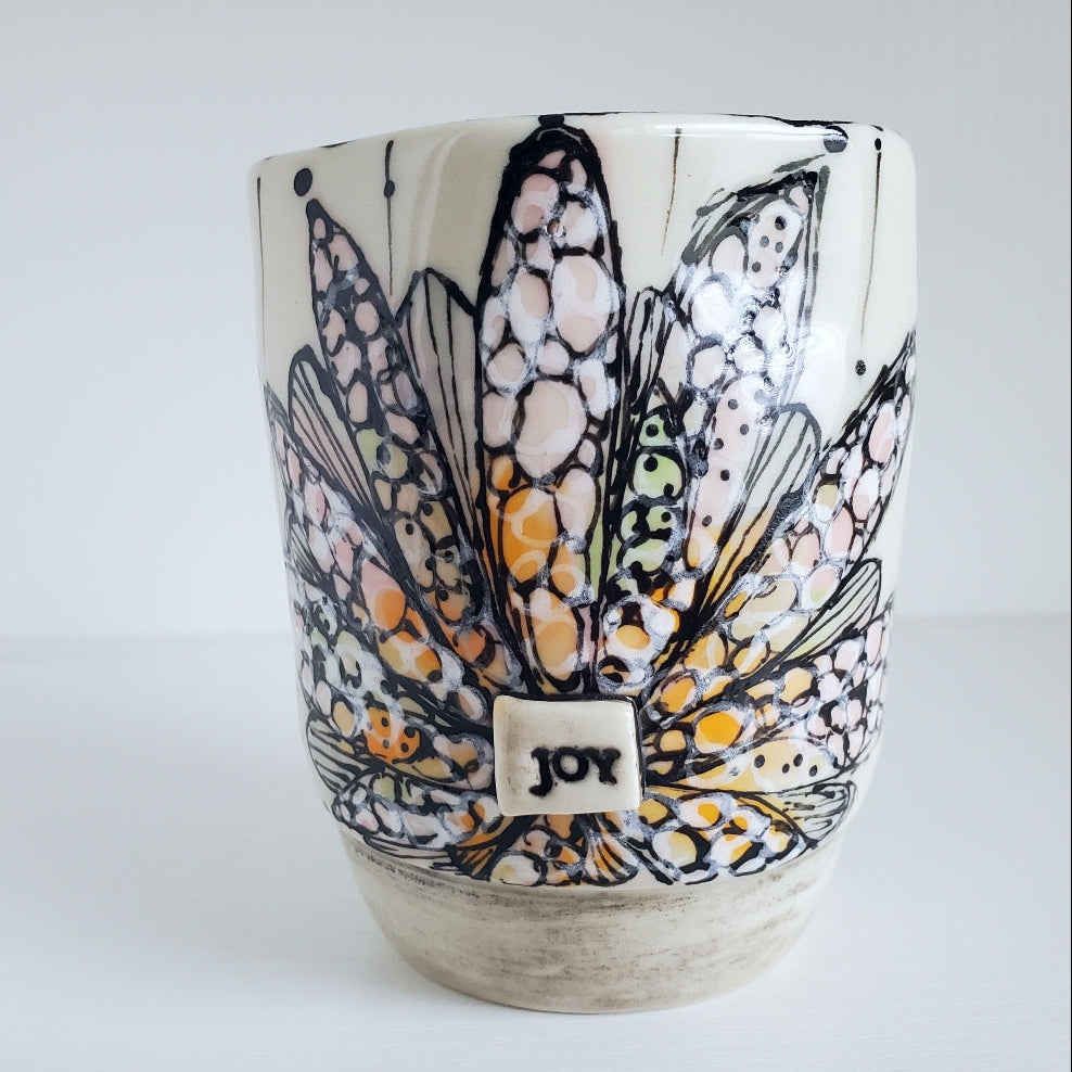 Ceramic cup with wings