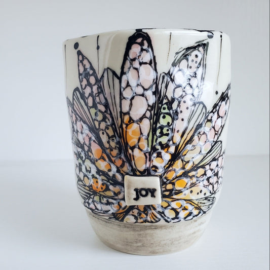 Ceramic cup with wings