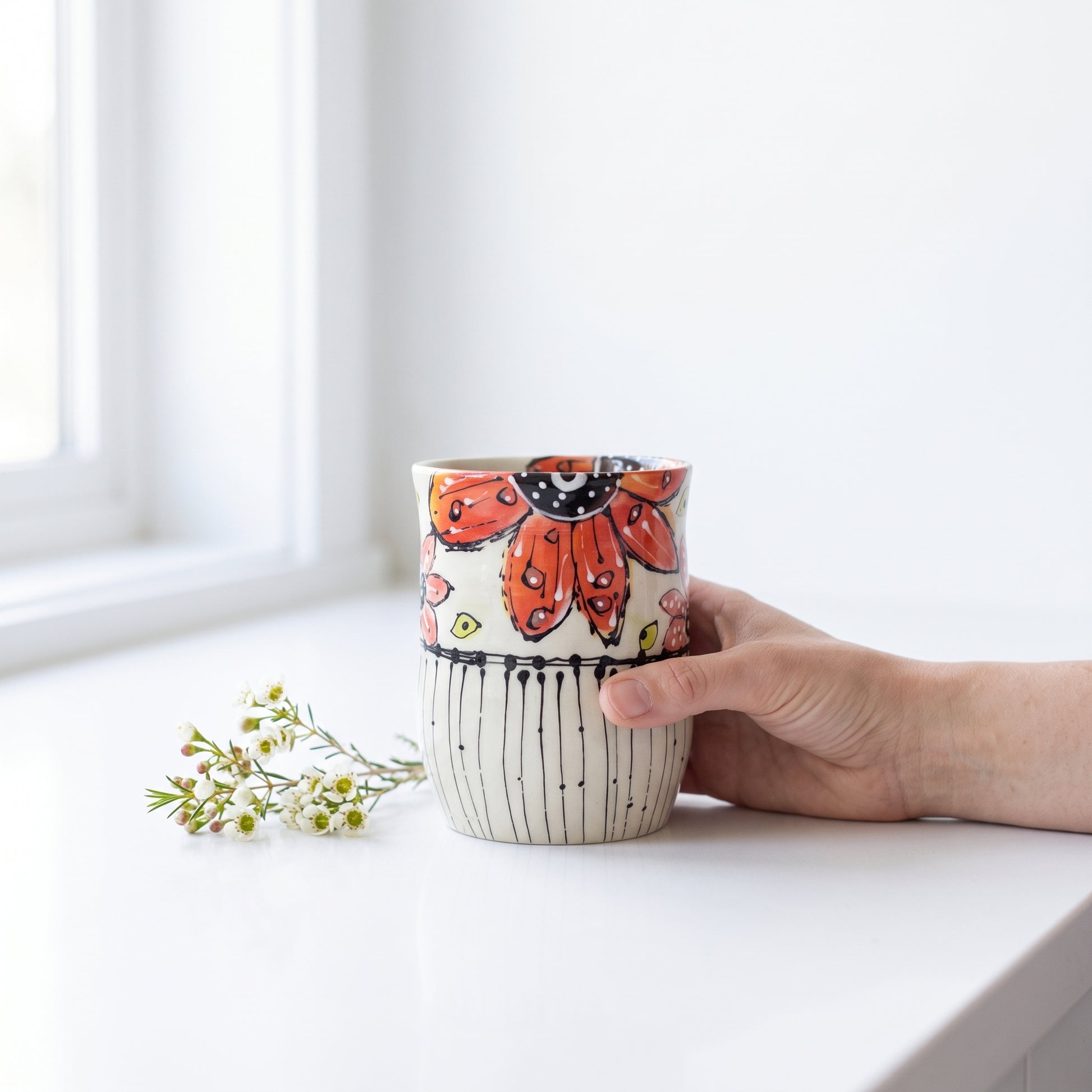 Studio photo of Everyday JOY - Colorful Cup | Wildflowers Gather - Red & Pink in lifestyle